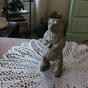 Vintage cast metal bear money box.